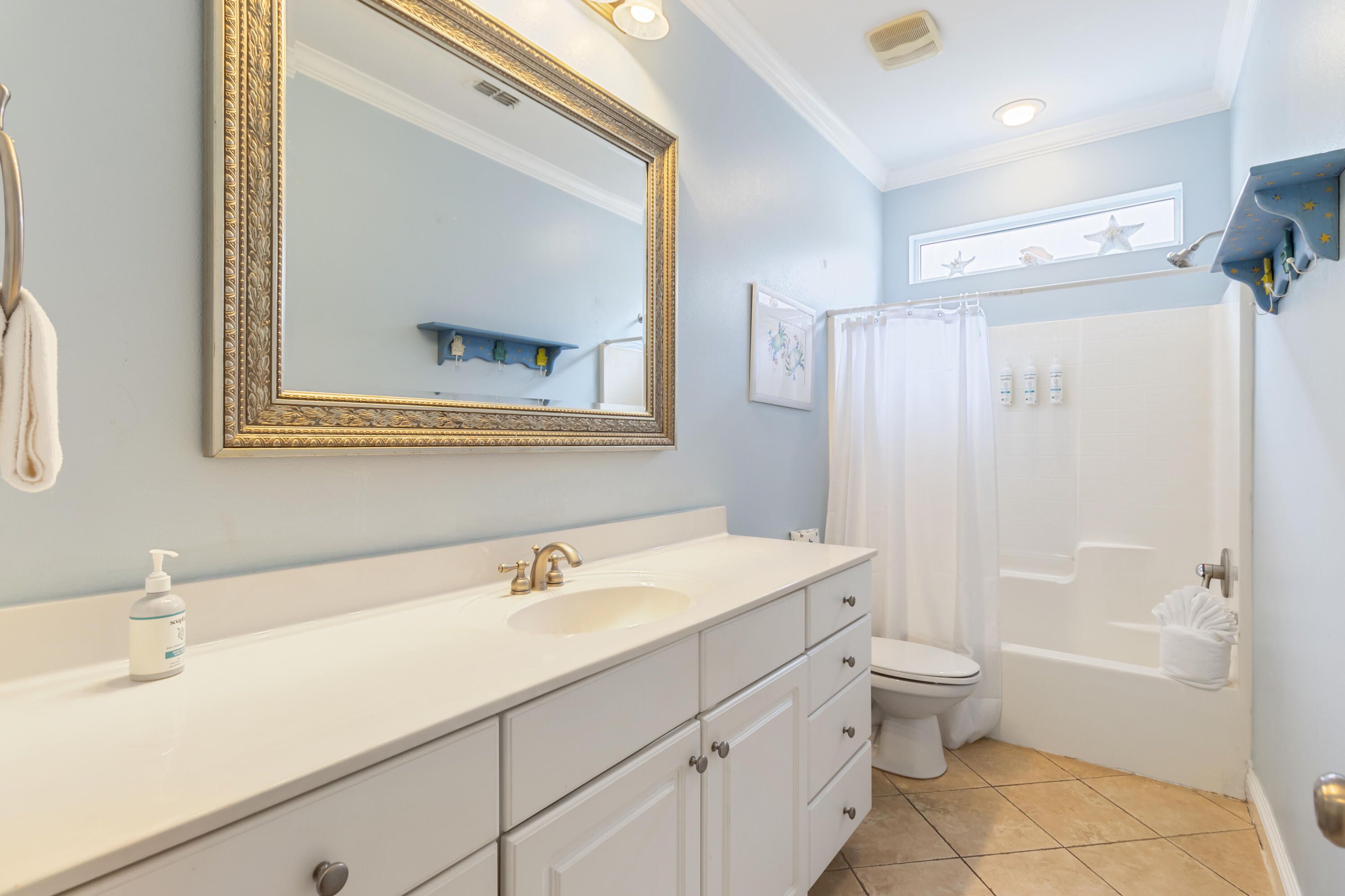 235 Kono Way Destin, FL 32541 - Photo 32 of 42 a bathroom with a sink toilet tub and shower