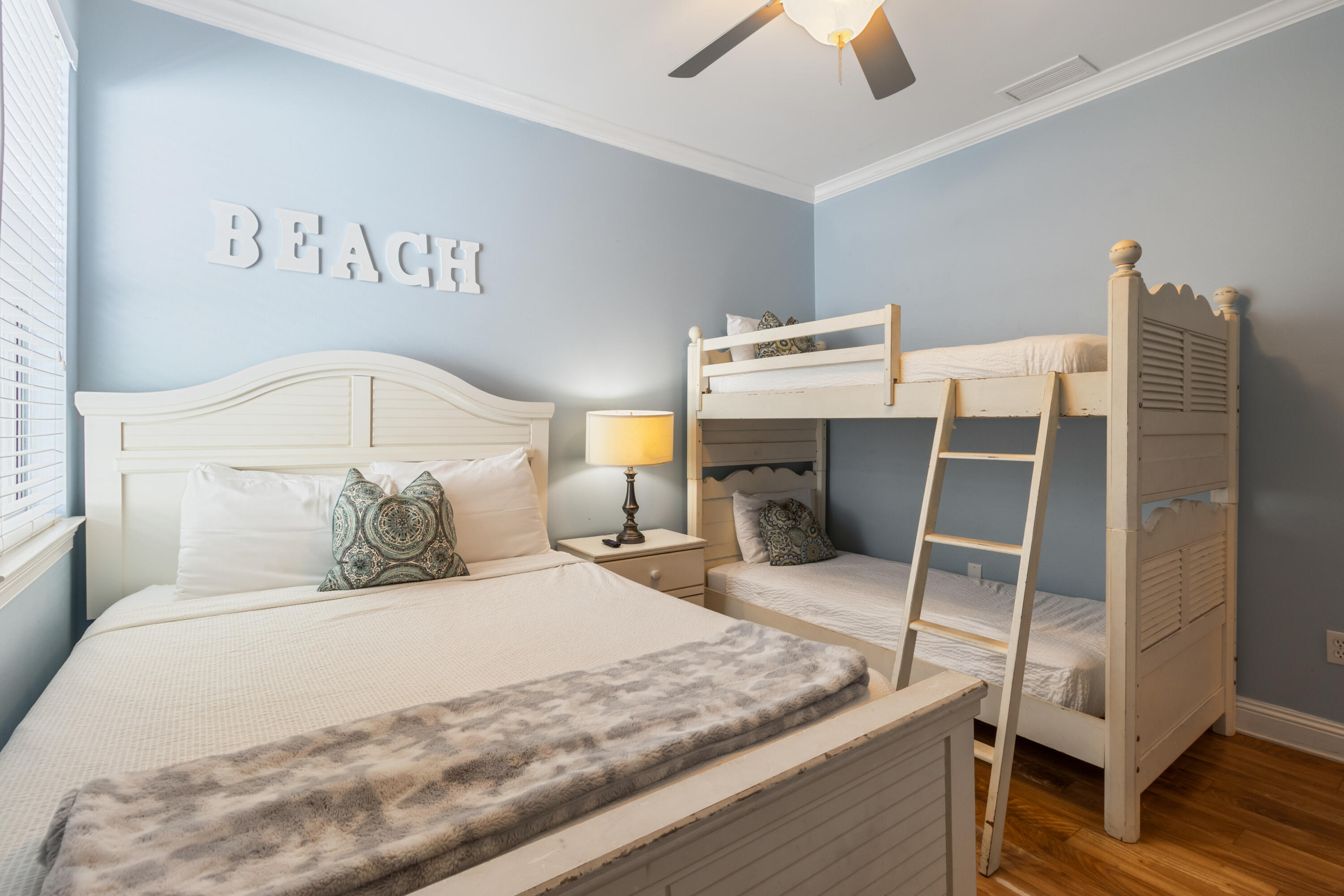 235 Kono Way Destin, FL 32541 - Photo 33 of 42 a bedroom with a bed and a flat tv screen