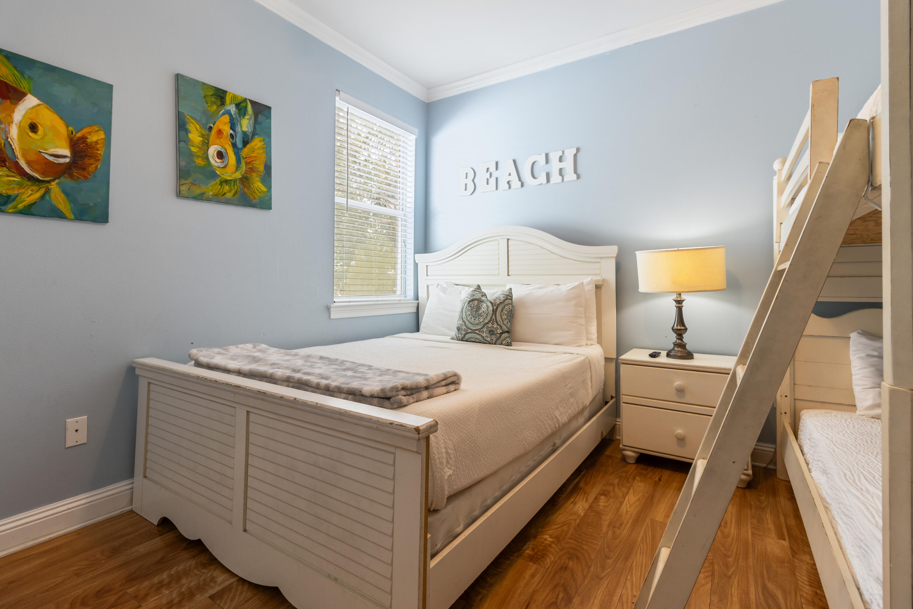 235 Kono Way Destin, FL 32541 - Photo 34 of 42 a bedroom with a bed and painting on the wall