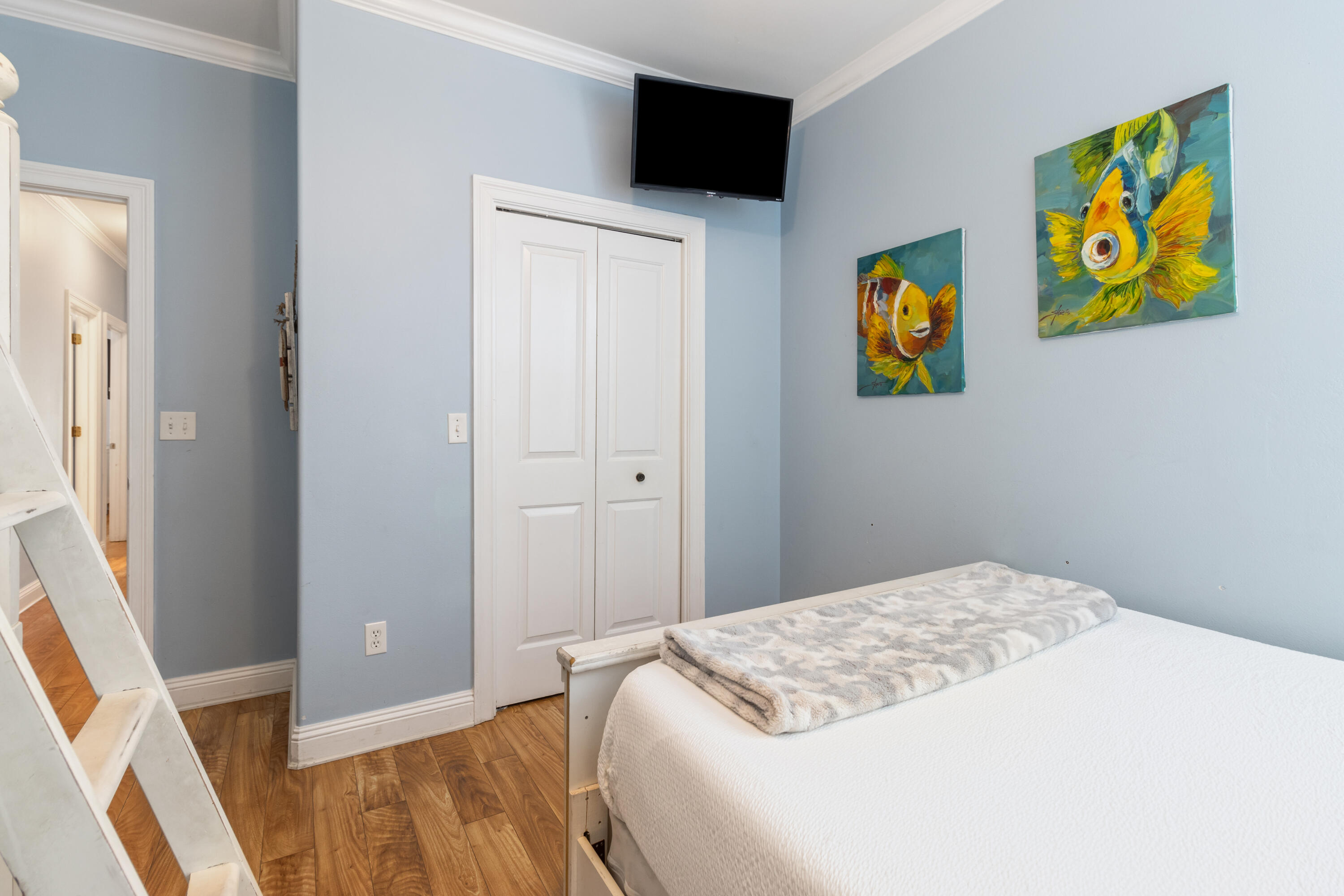 235 Kono Way Destin, FL 32541 - Photo 35 of 42 a bedroom with bed and painting on the wall