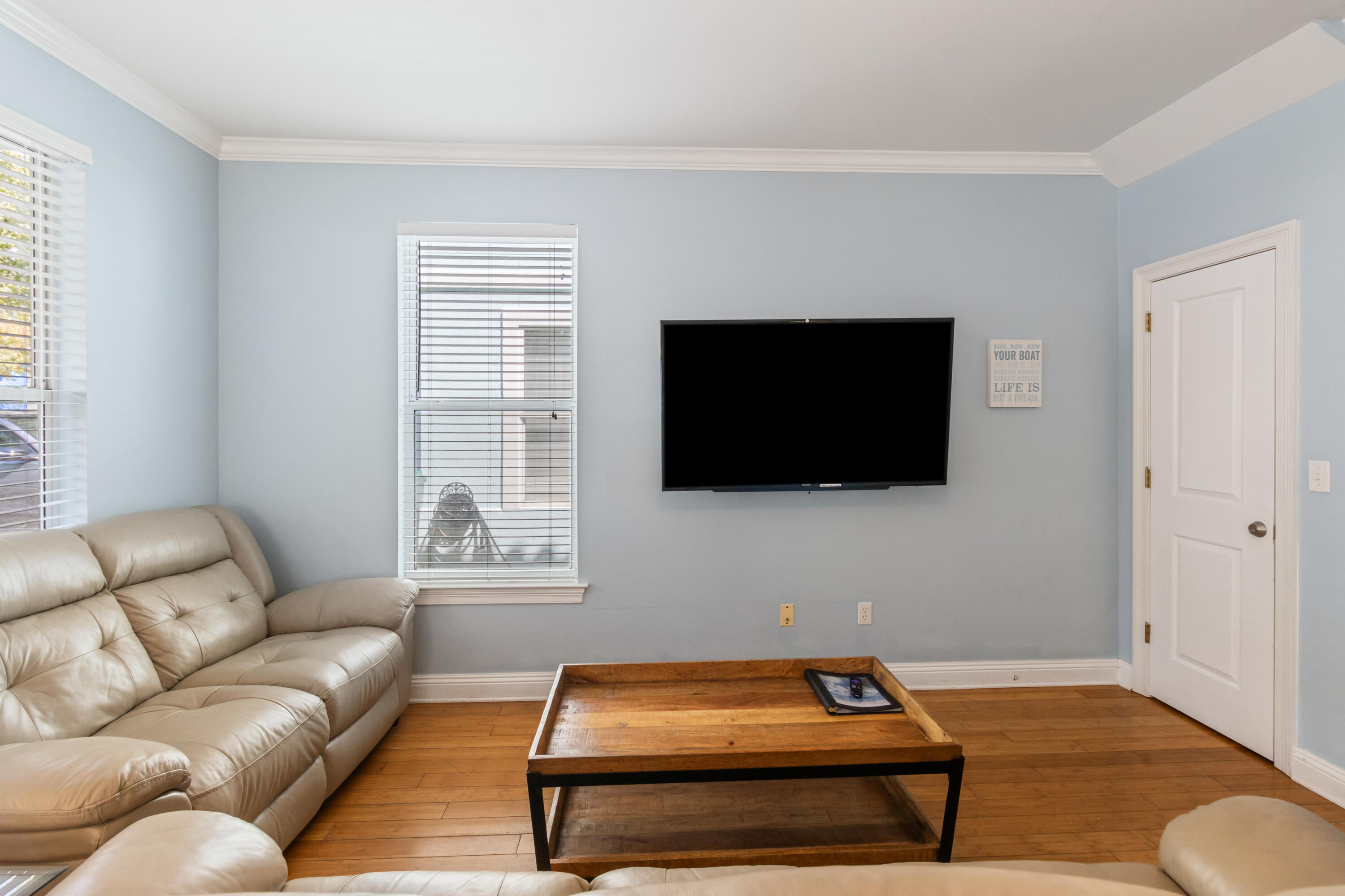 235 Kono Way Destin, FL 32541 - Photo 38 of 42 a living room with furniture and a flat screen tv