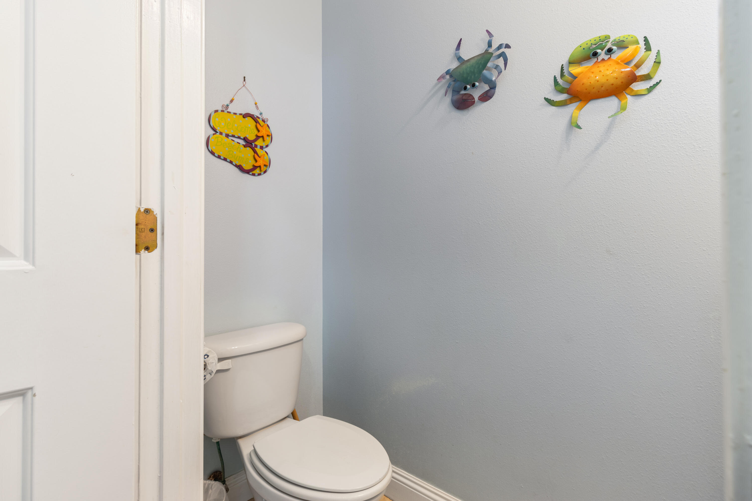 235 Kono Way Destin, FL 32541 - Photo 41 of 42 a bathroom with a toilet and a sink