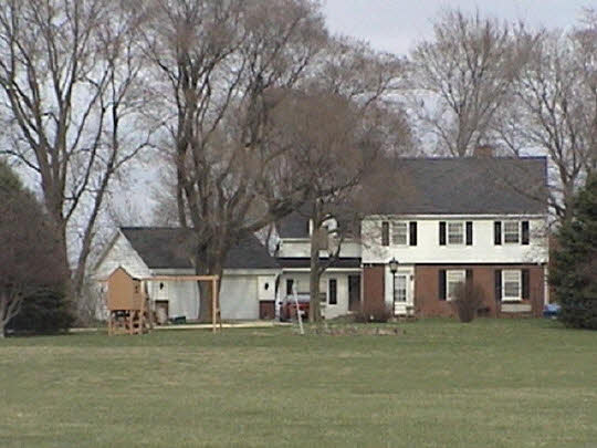 3561 Carlson Road Garden Prairie, IL 61038 - Photo 1 of 1 a view of house with outdoor space and tree in the background