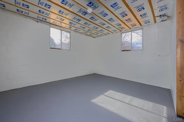 an empty room with windows