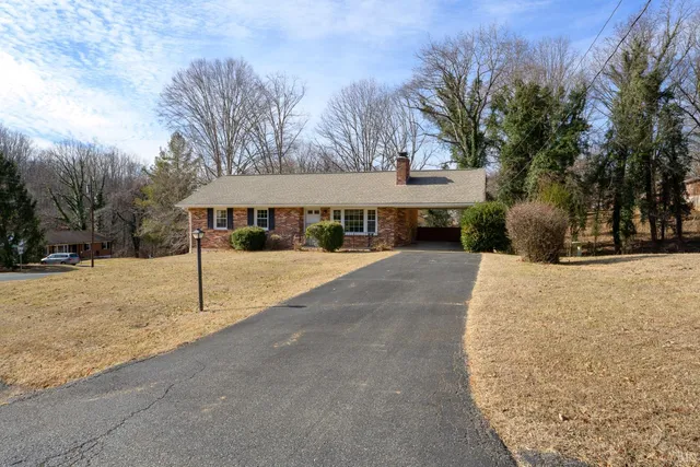 a view of a yard covered with snow