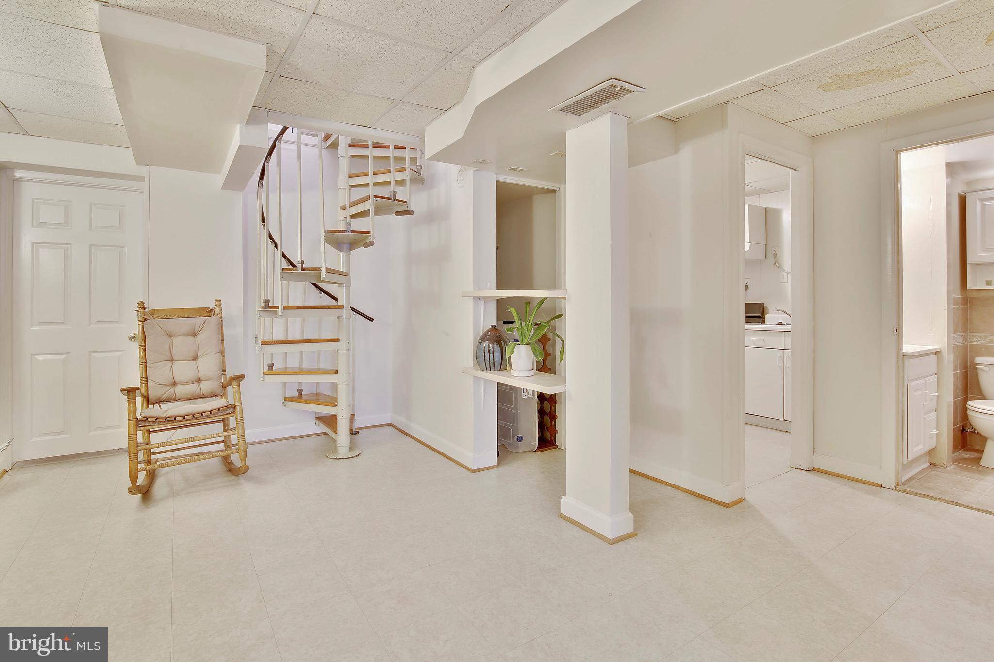 5114 Hollywood Road College Park, MD 20740 - Photo 16 of 22 a view of entryway with stairs and furniture