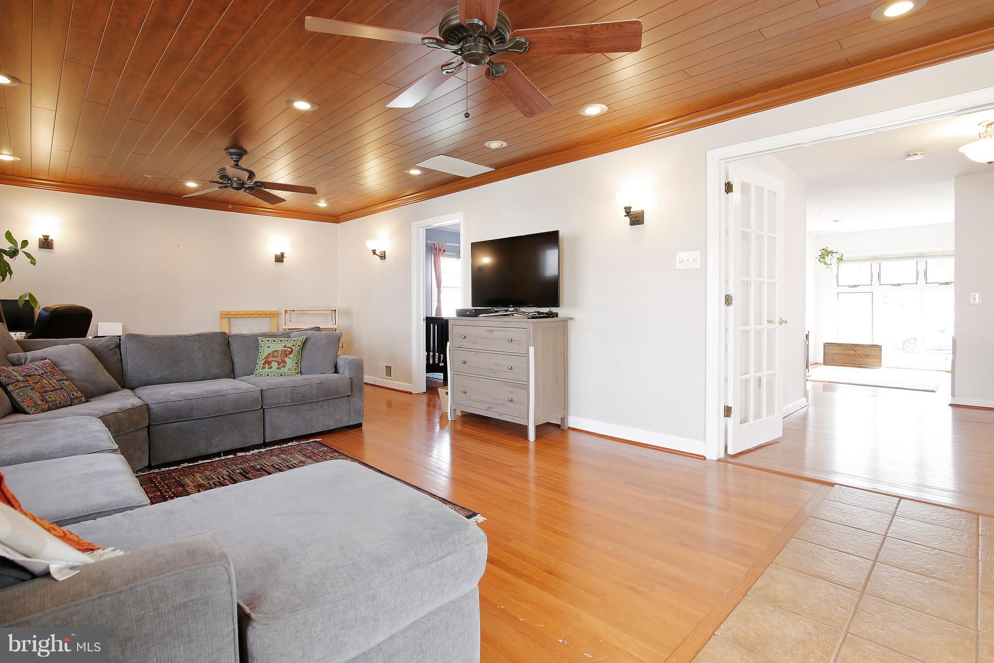 5114 Hollywood Road College Park, MD 20740 - Photo 9 of 22 a living room with furniture and a flat screen tv