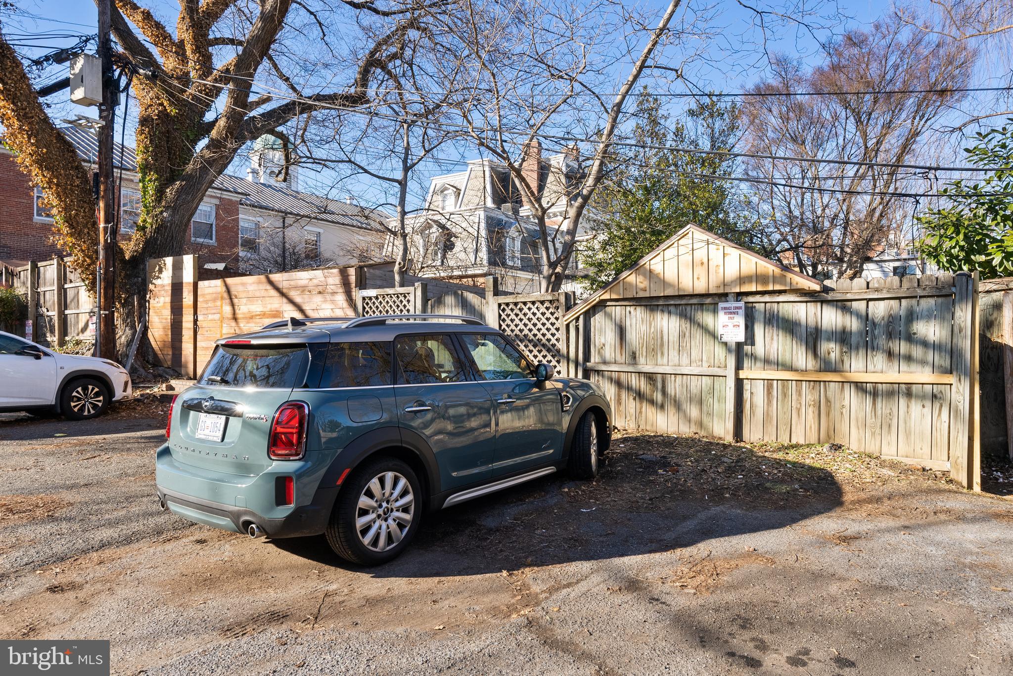 3237 N Street Northwest, Unit 16 Washington, DC 20007 - Photo 11 of 16 a car parked in front of a house