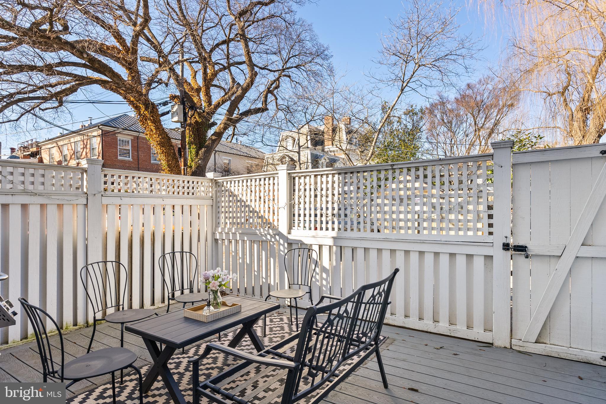 3237 N Street Northwest, Unit 16 Washington, DC 20007 - Photo 9 of 16 a view of a chairs with wooden fence