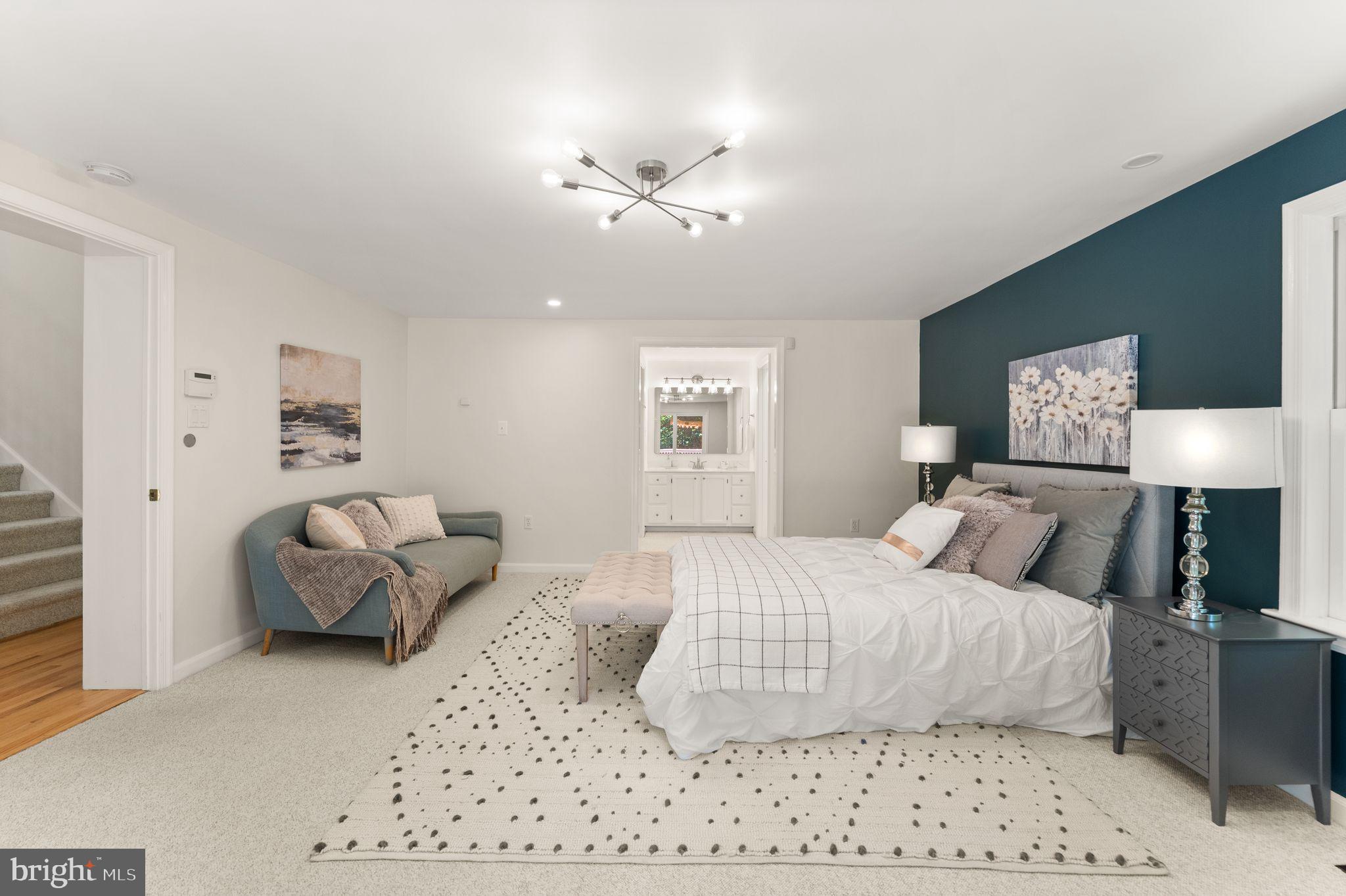 38620 Lime Kiln Road Leesburg, VA 20175 - Photo 29 of 87 a bedroom with a bed and wooden floor