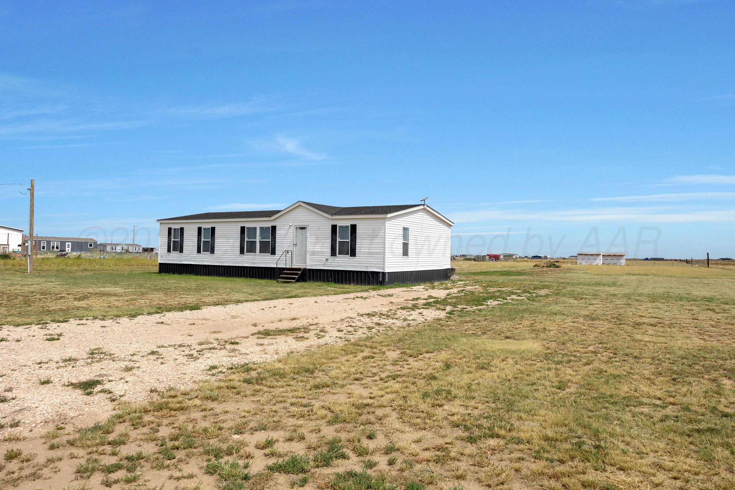 7979 Juett Attebury Road Amarillo, TX 79118 - Photo 18 of 22 a house view with lake view