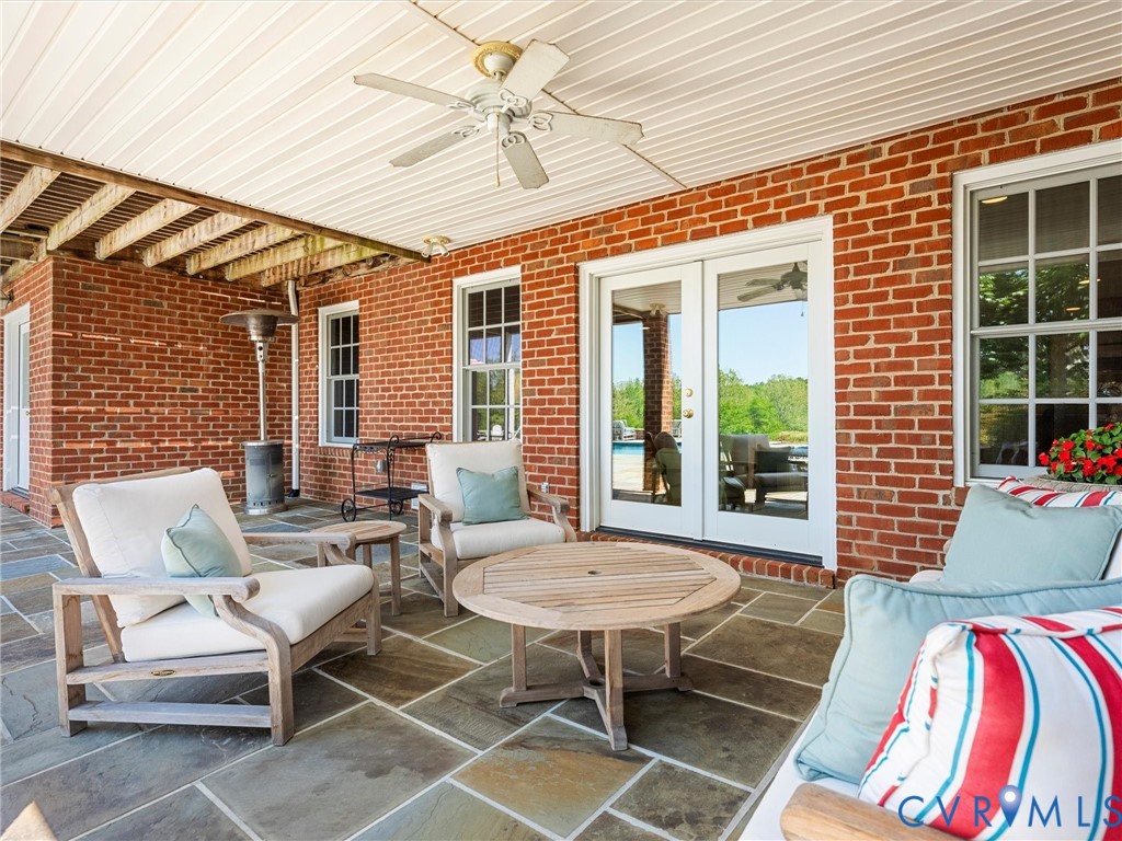 1887 Sheppard Town Road Crozier, VA 23039 - Photo 56 of 98 Lower Level Covered Patio