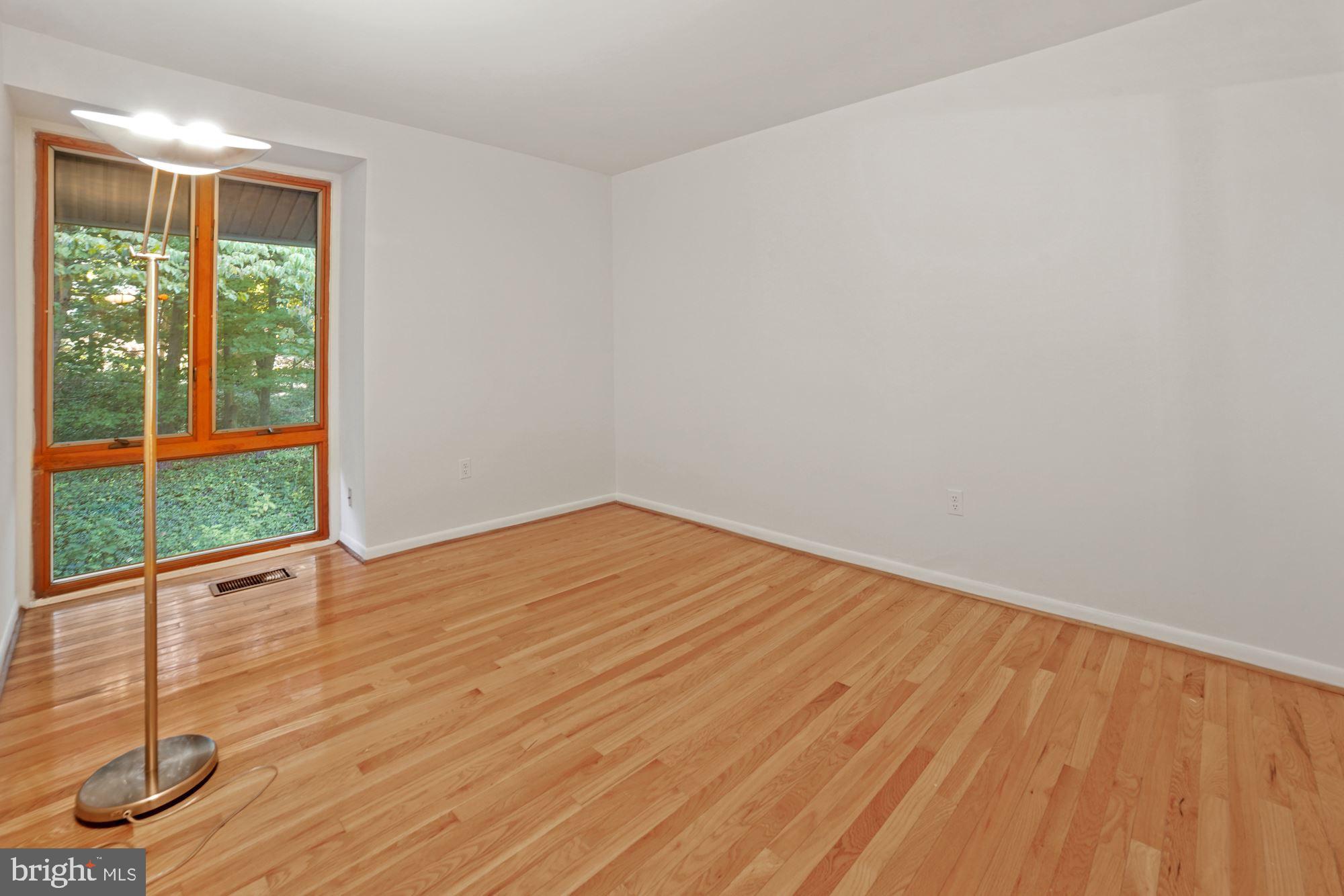 9205 Three Oaks Drive Silver Spring, MD 20901 - Photo 16 of 30 Second bedroom with hardwood floor
