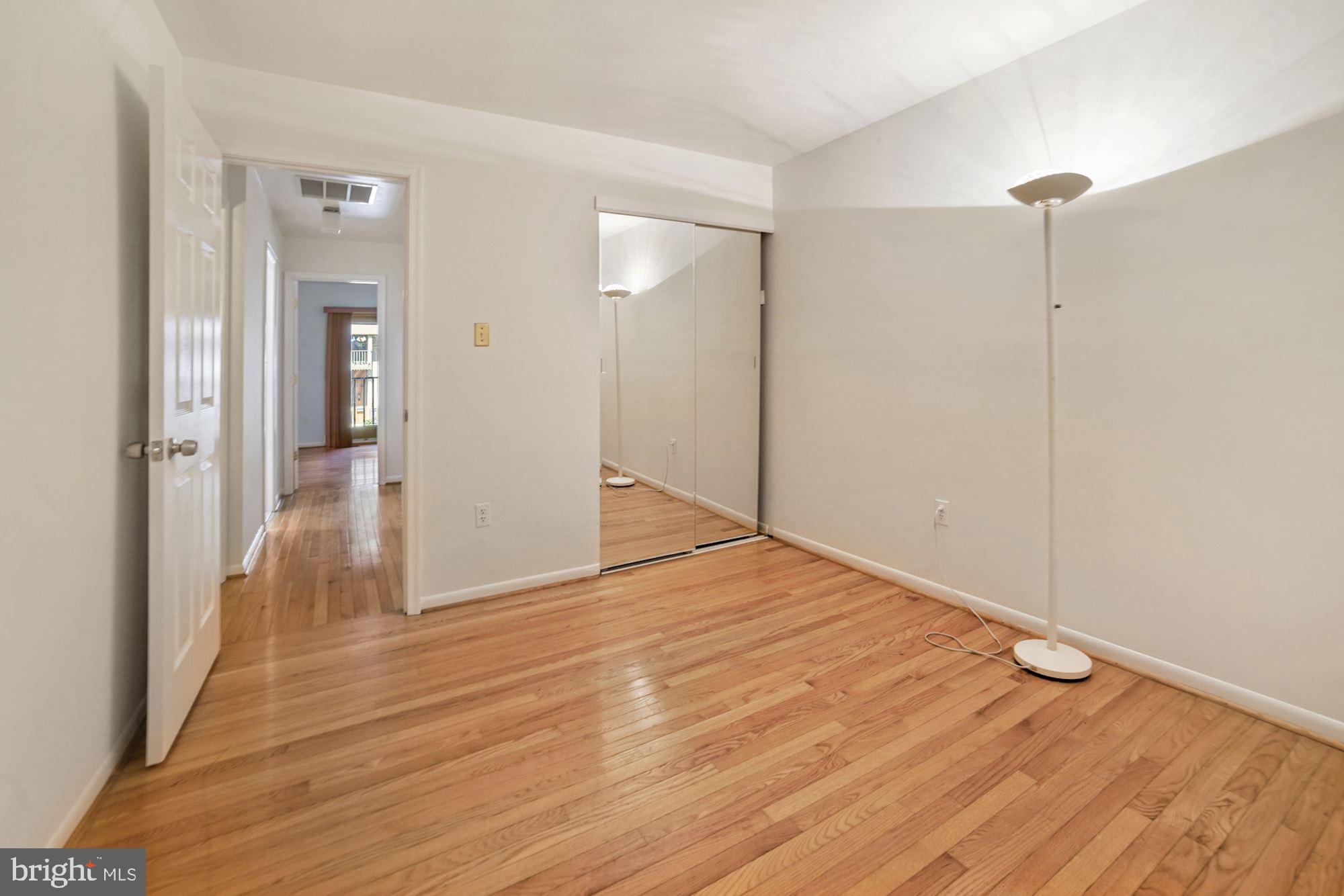 9205 Three Oaks Drive Silver Spring, MD 20901 - Photo 18 of 30 Third bedroom with deep closet and hardwood floor