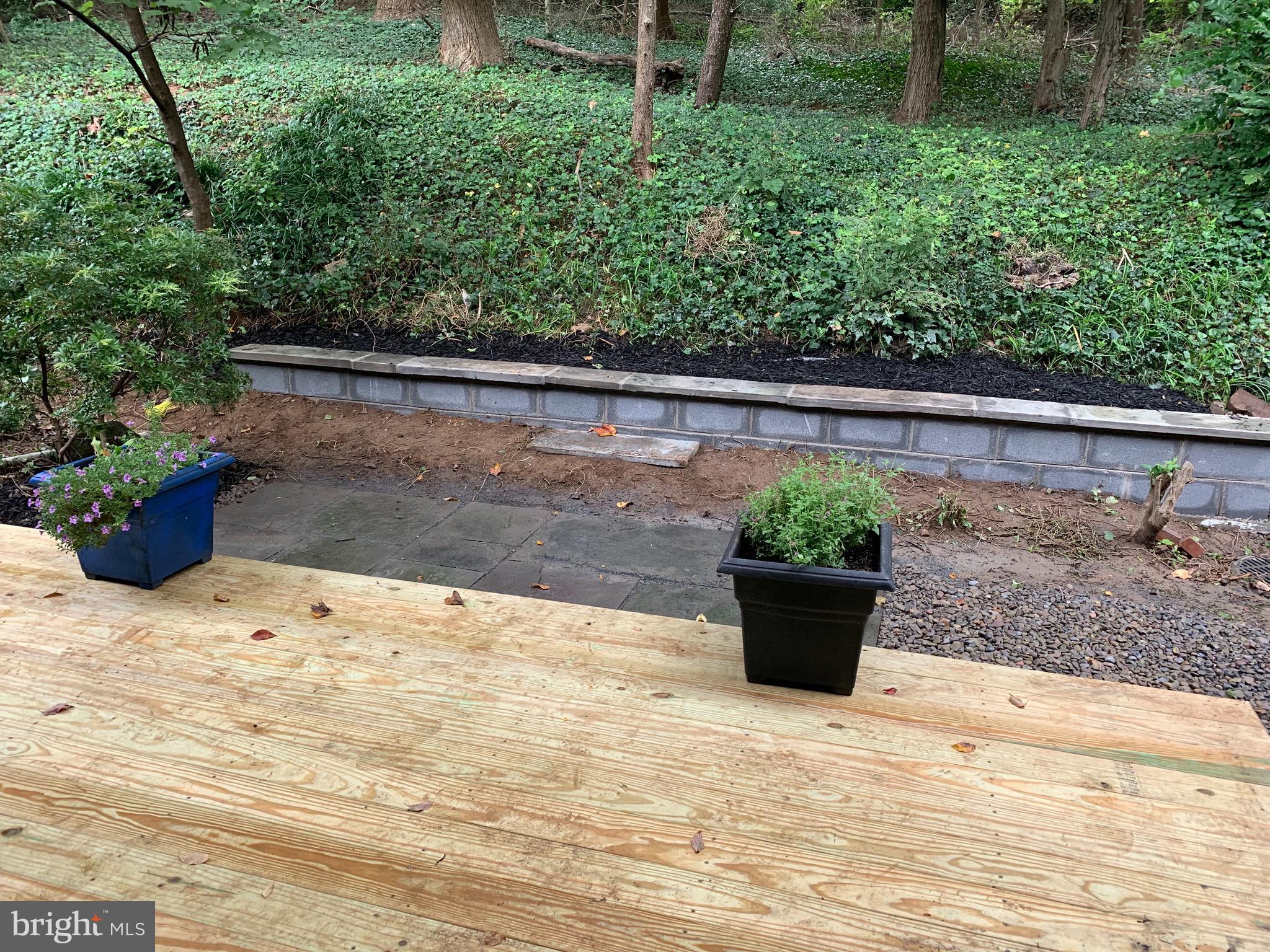 9205 Three Oaks Drive Silver Spring, MD 20901 - Photo 22 of 30 retaining wall in the end of the property