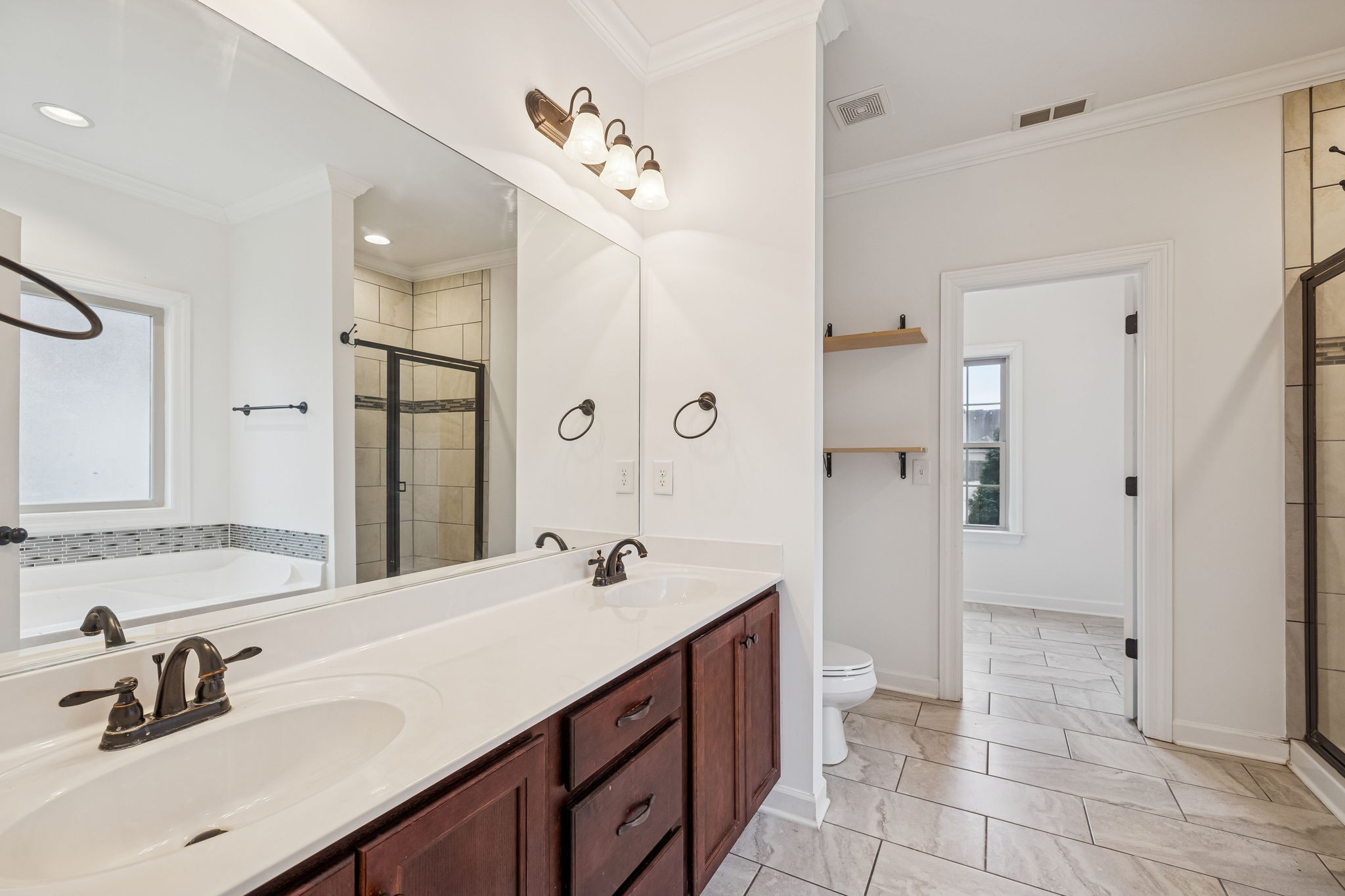 2912 Butterfly Bend Murfreesboro, TN 37129 - Photo 36 of 48 a bathroom with a sink double vanity and a mirror