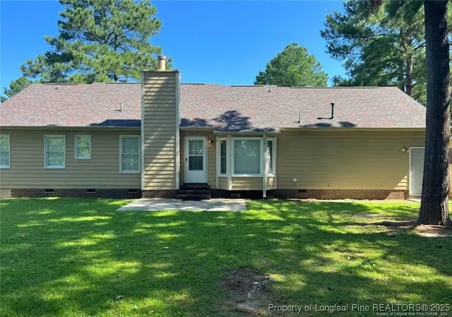 a view of a backyard with a garden