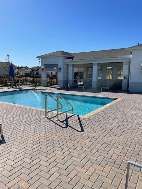 6000 Southeast Sky Blue Circle Stuart, FL 34997 - Photo 14 of 18 clean & crisp pool deck