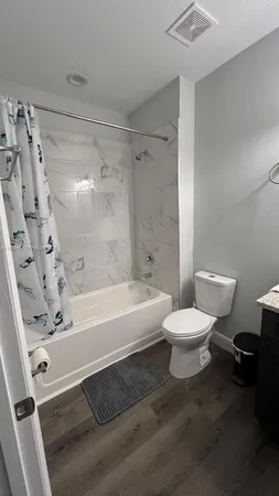 a wooden bench sitting in a room