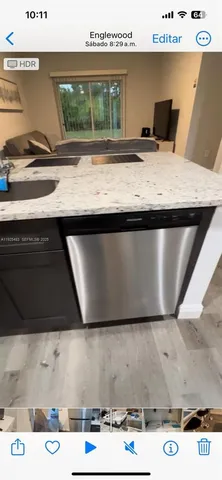 a view of kitchen with wooden floor