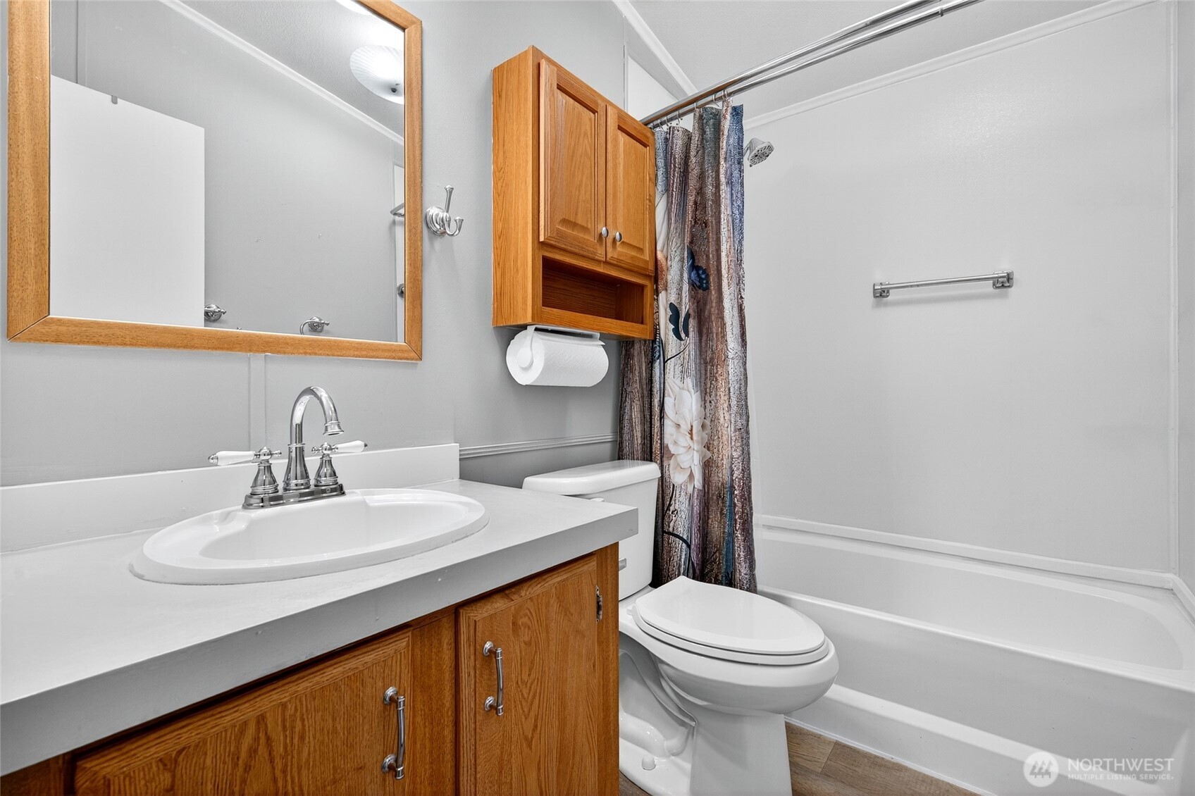 23825 15th Avenue Southeast, Unit 93 Bothell, WA 98021 - Photo 11 of 34 a bathroom with a sink vanity mirror and toilet