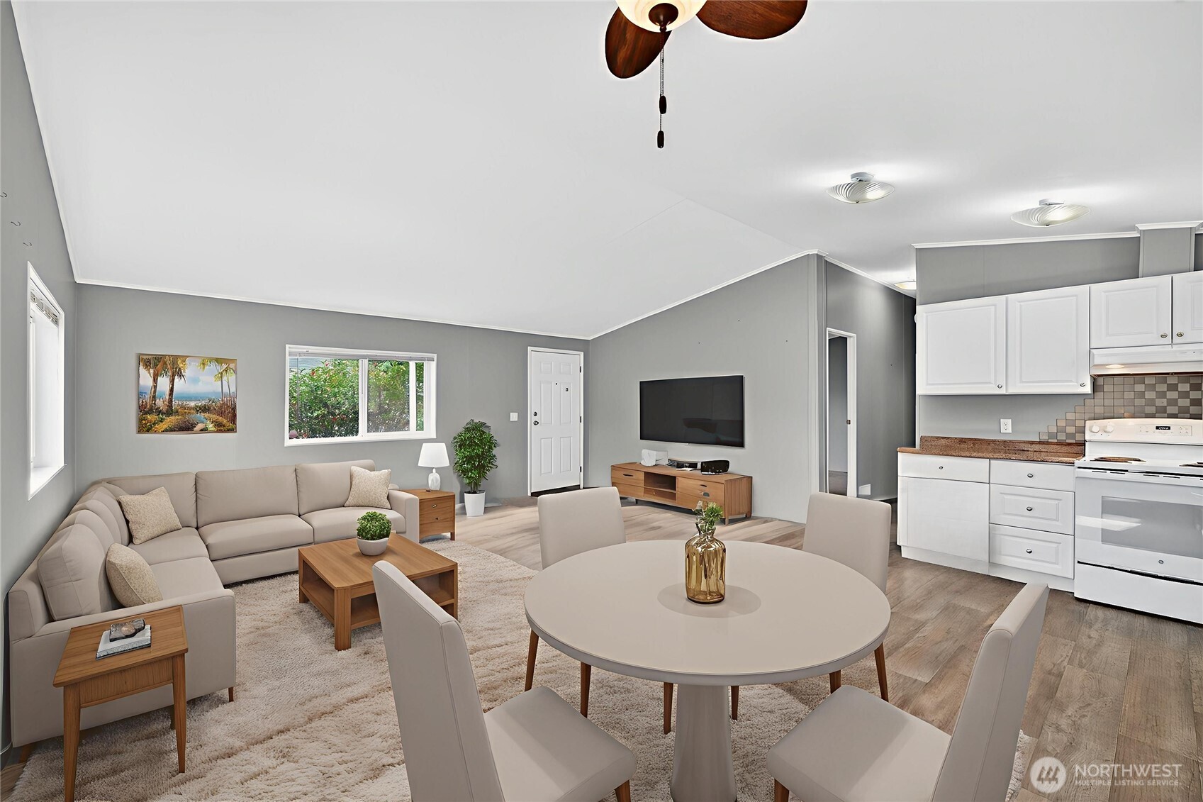 23825 15th Avenue Southeast, Unit 93 Bothell, WA 98021 - Photo 2 of 34 a living room with furniture and a flat screen tv