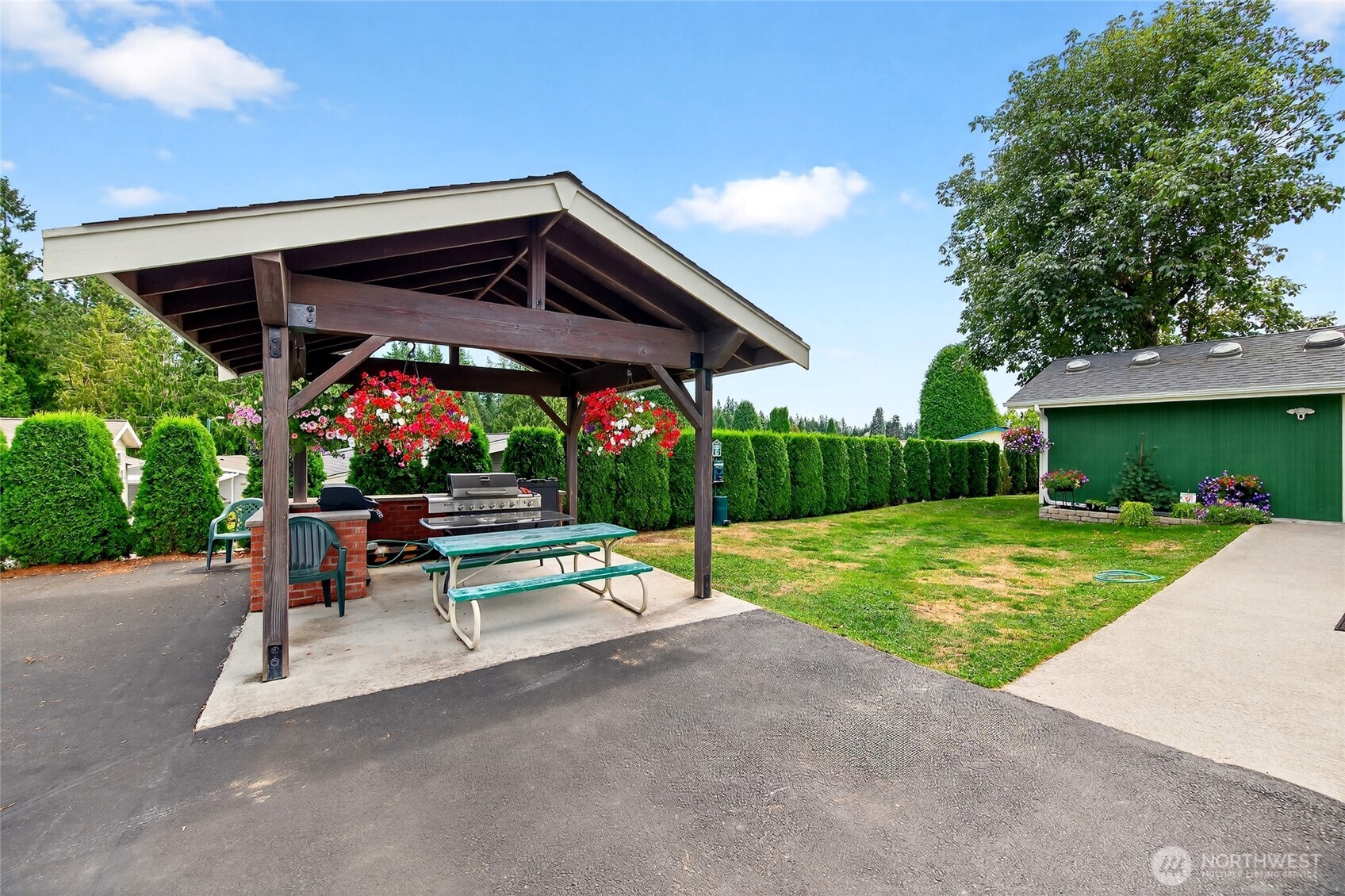 23825 15th Avenue Southeast, Unit 93 Bothell, WA 98021 - Photo 27 of 34 a view of a two chairs in the patio