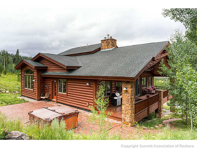 729 Willowbrook Road Silverthorne, CO 80498 - Photo 2 of 25 Exterior Back. Private back patio with hot tub and large covered front porch.