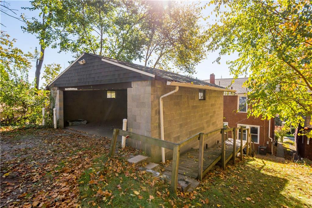 243 Castle Shannon Boulevard, Unit 243 Pittsburgh, PA 15228 - Photo 19 of 26 a front view of a house with a yard