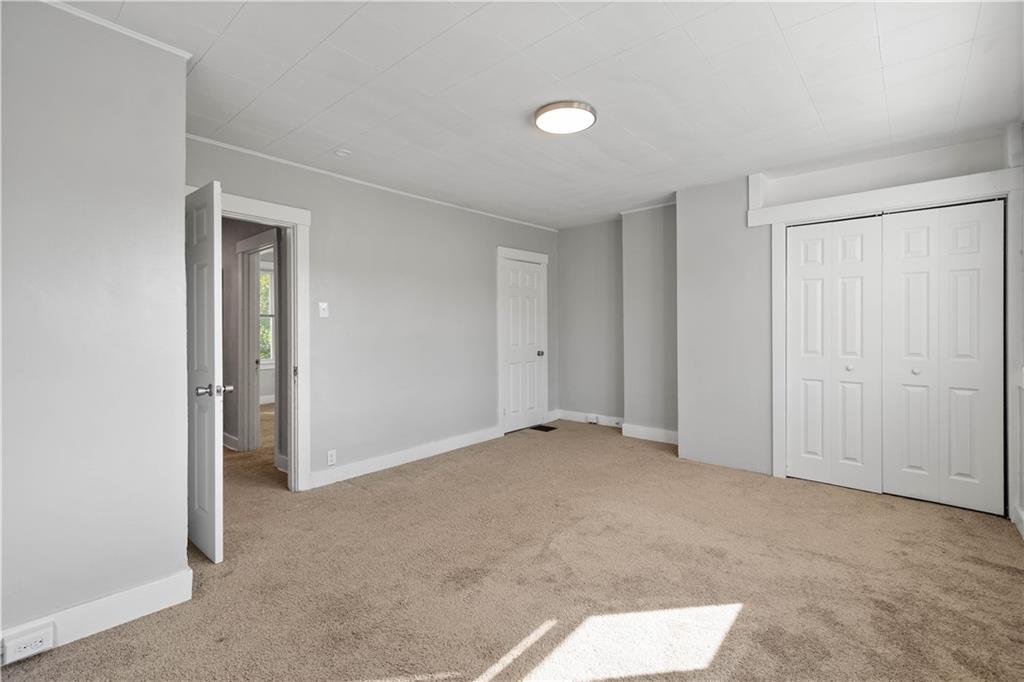 243 Castle Shannon Boulevard, Unit 243 Pittsburgh, PA 15228 - Photo 26 of 26 an empty room with closet area