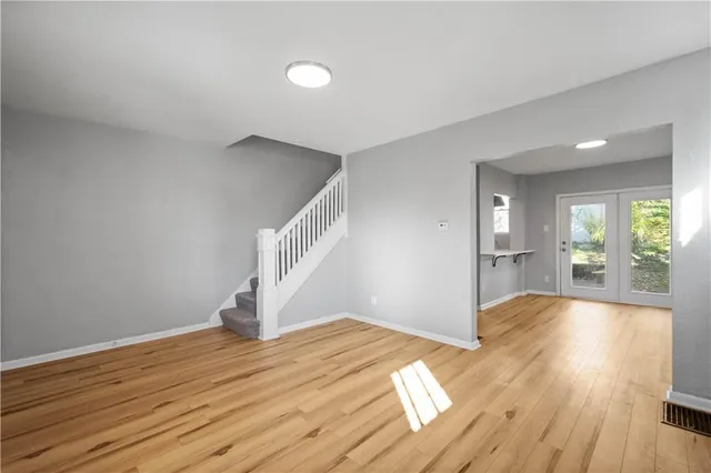 a view of a livingroom with wooden floor