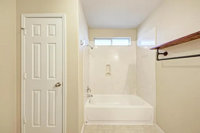 a bathroom with a bathtub