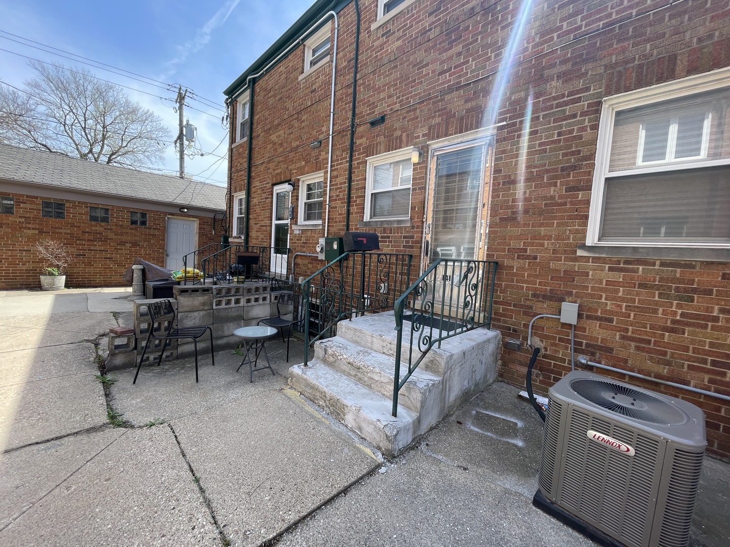 Undisclosed Address Oak Park, IL 60302 - Photo 15 of 15 a view of a patio with couches table and chairs and potted plants