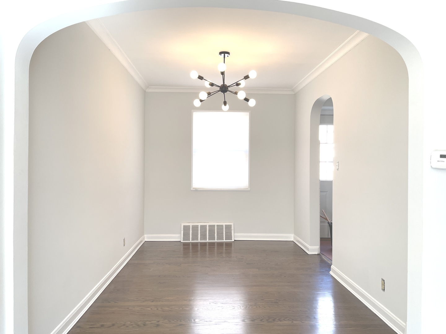 Undisclosed Address Oak Park, IL 60302 - Photo 8 of 15 a view of a livingroom with wooden floor