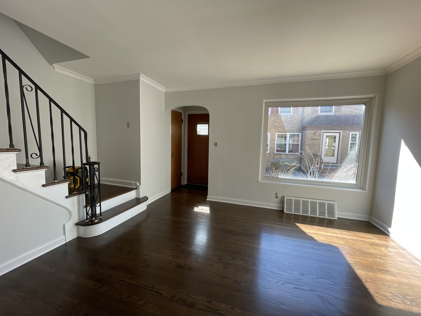Undisclosed Address Oak Park, IL 60302 - Photo 10 of 15 a view of an empty room with wooden floor and a window