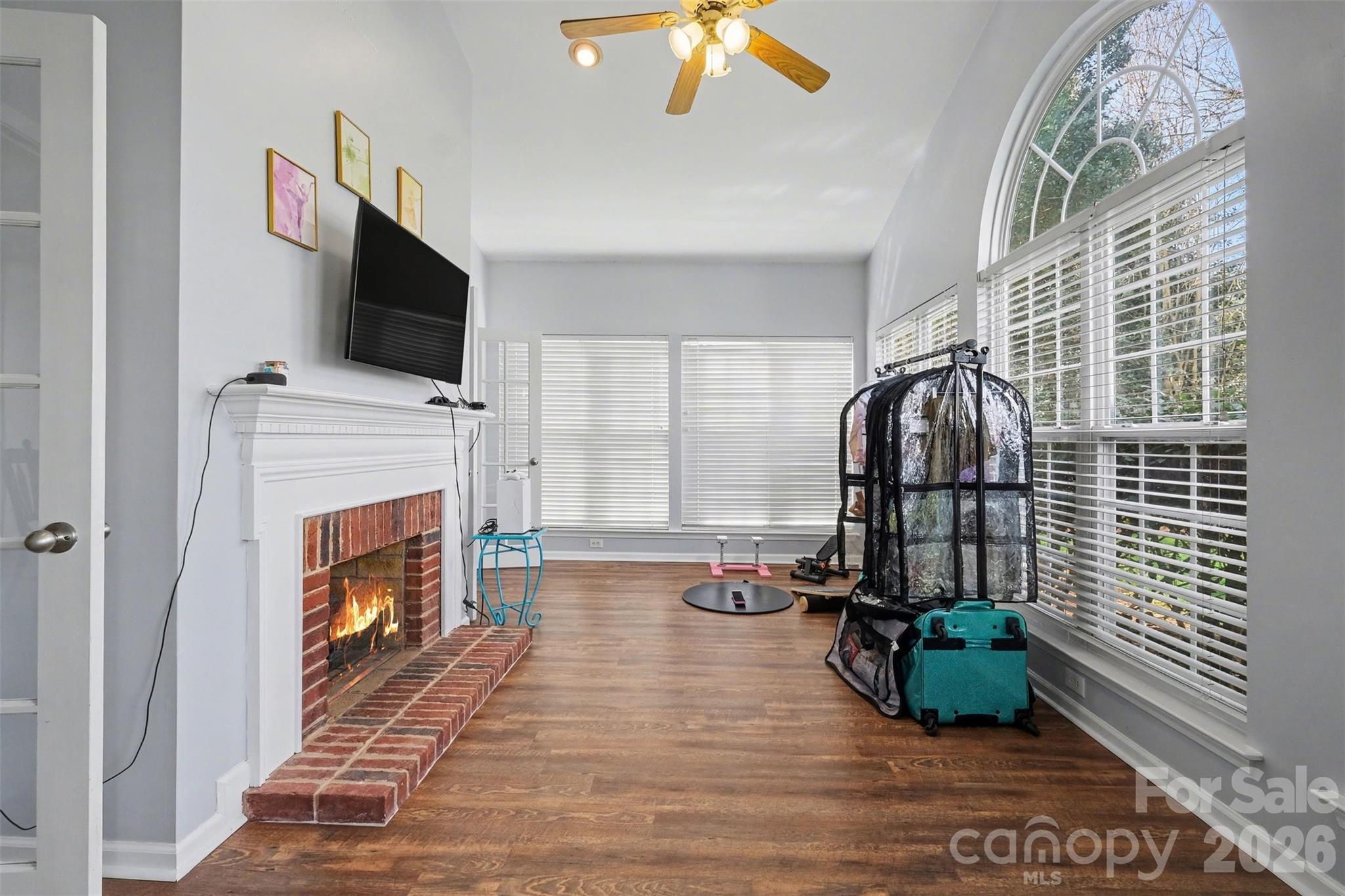 523 Whitehead Court Fort Mill, SC 29708 - Photo 20 of 48 a living room with furniture fireplace and flat screen tv