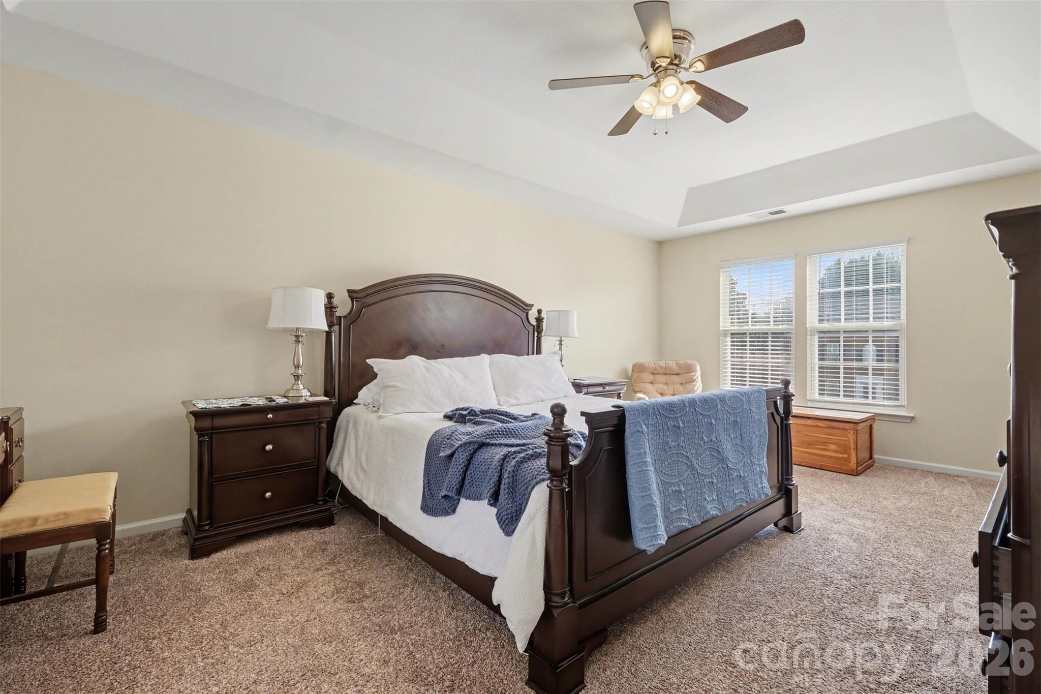 523 Whitehead Court Fort Mill, SC 29708 - Photo 23 of 48 a bed room with a bed and a chair