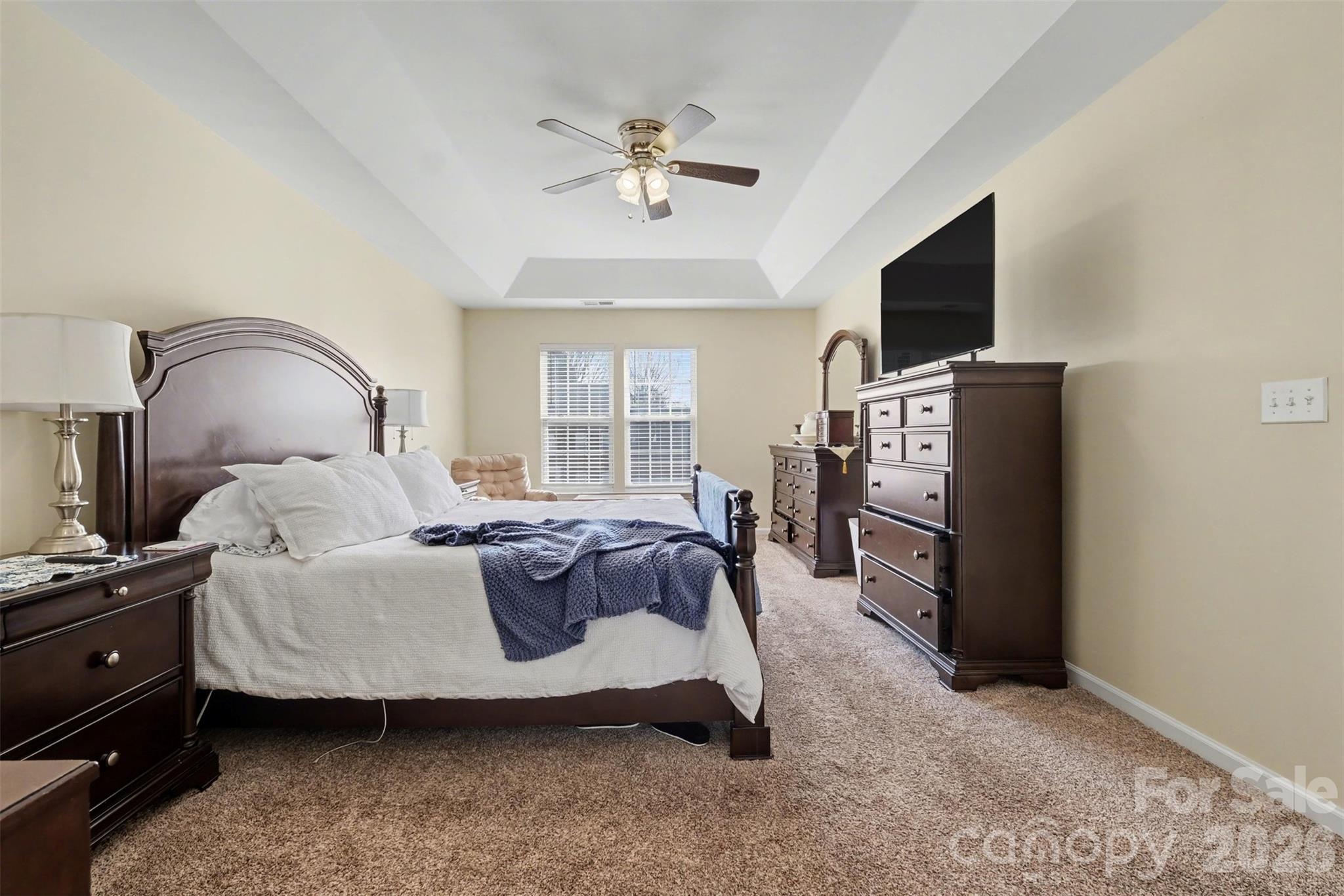 523 Whitehead Court Fort Mill, SC 29708 - Photo 25 of 48 a bed room with a bed and a television