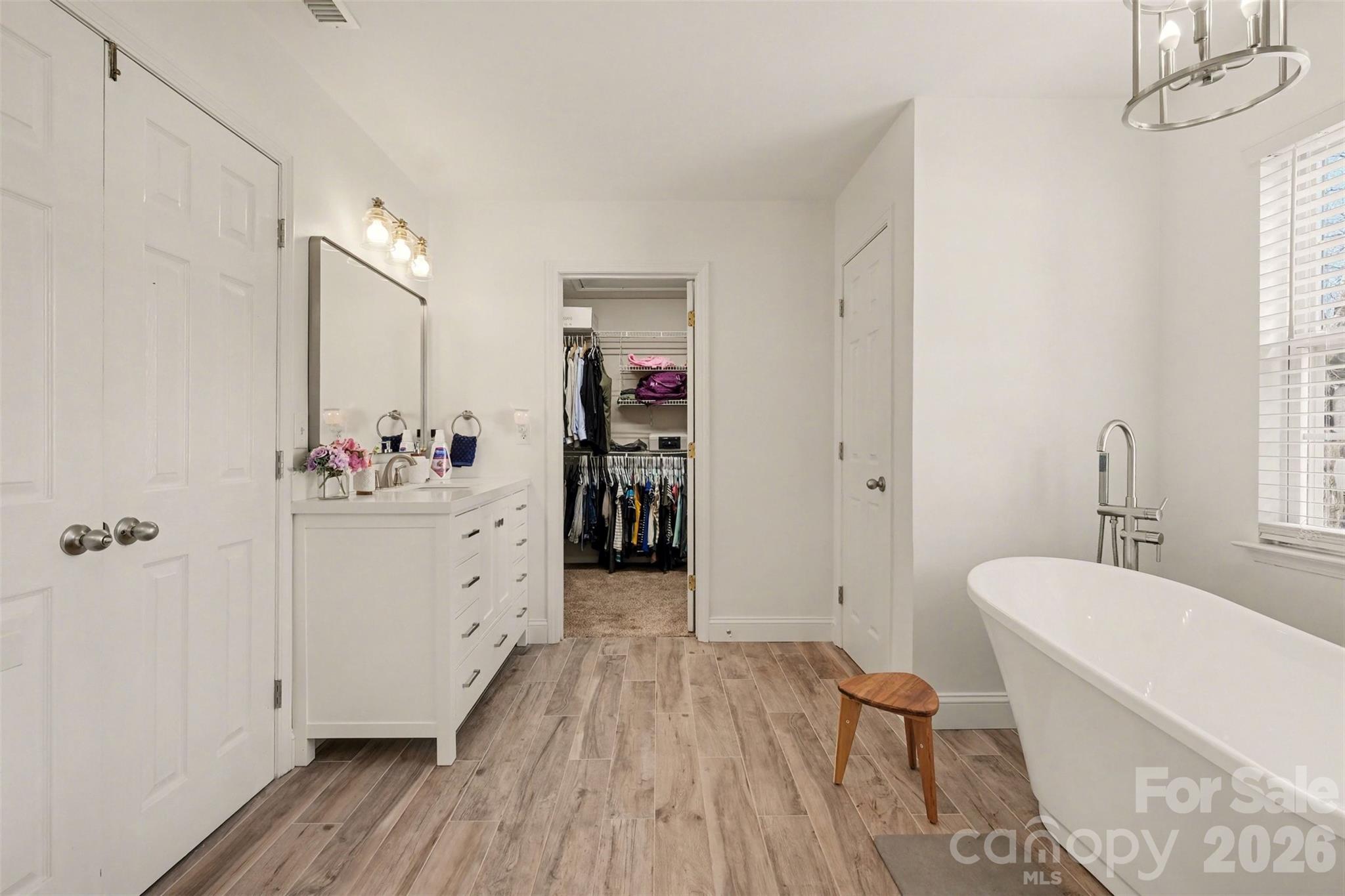 523 Whitehead Court Fort Mill, SC 29708 - Photo 26 of 48 a bathroom with a sink mirror and a bathtub
