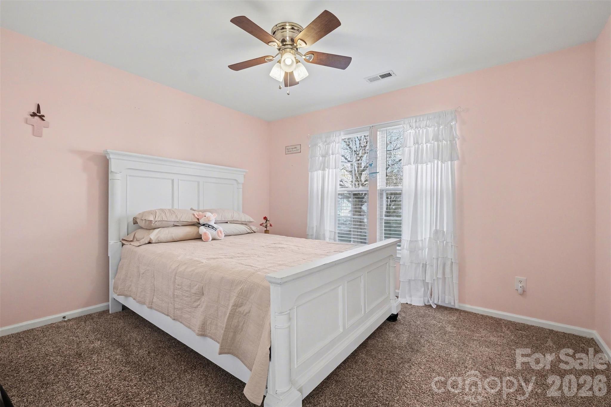 523 Whitehead Court Fort Mill, SC 29708 - Photo 31 of 48 a bedroom with a bed and a large window