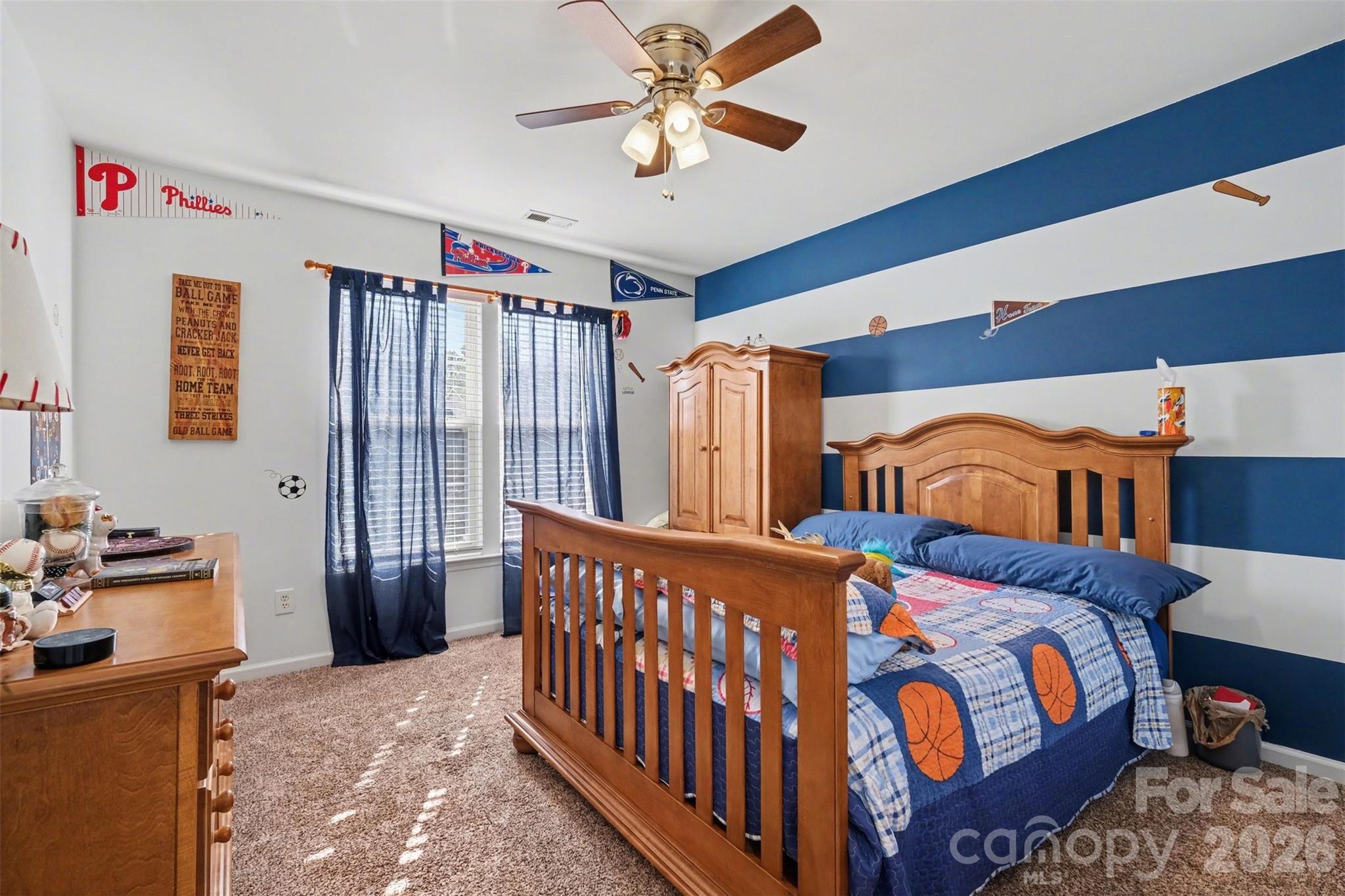 523 Whitehead Court Fort Mill, SC 29708 - Photo 32 of 48 a bedroom with furniture and a window