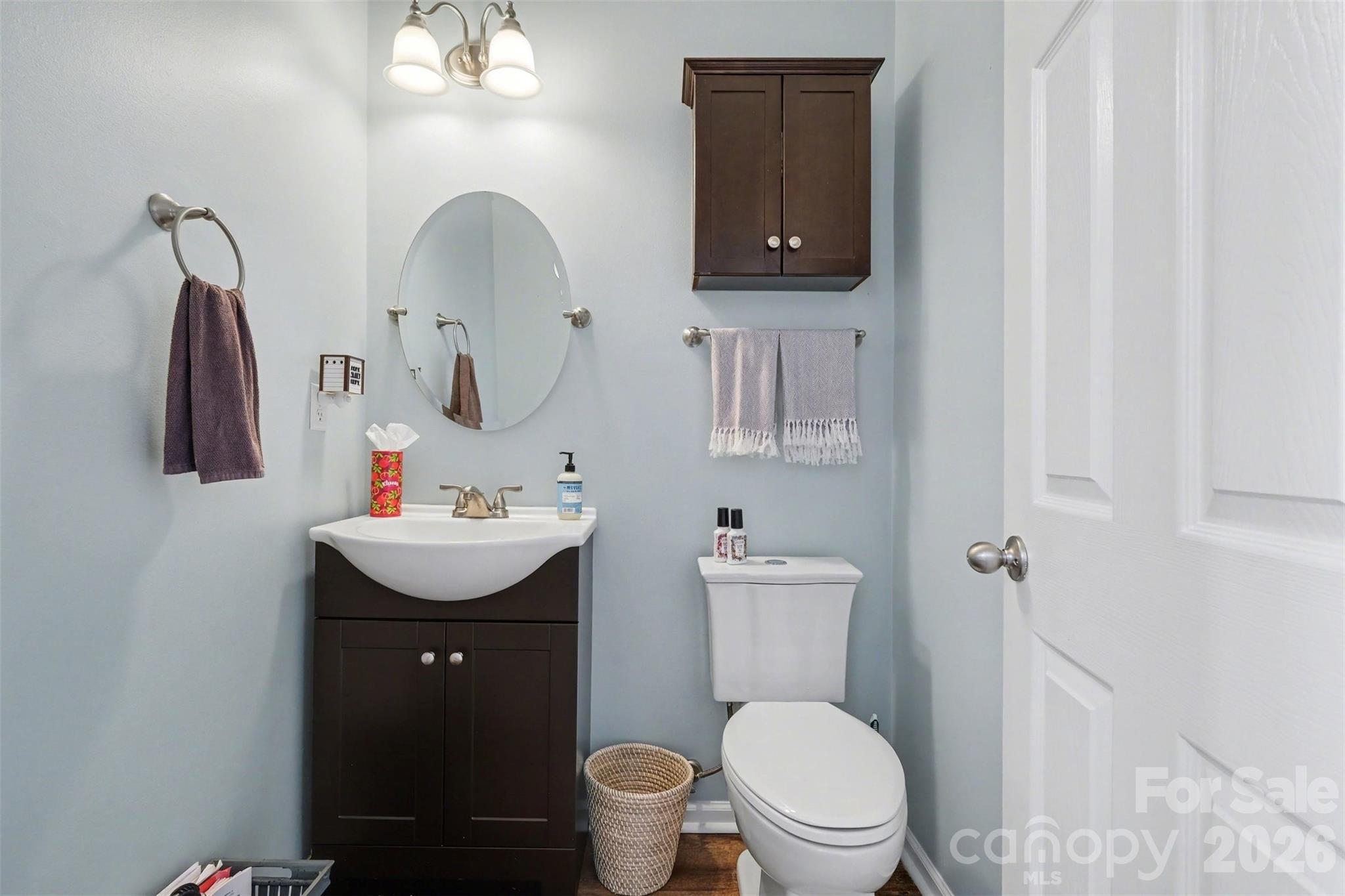 523 Whitehead Court Fort Mill, SC 29708 - Photo 38 of 48 a bathroom with a toilet sink and mirror