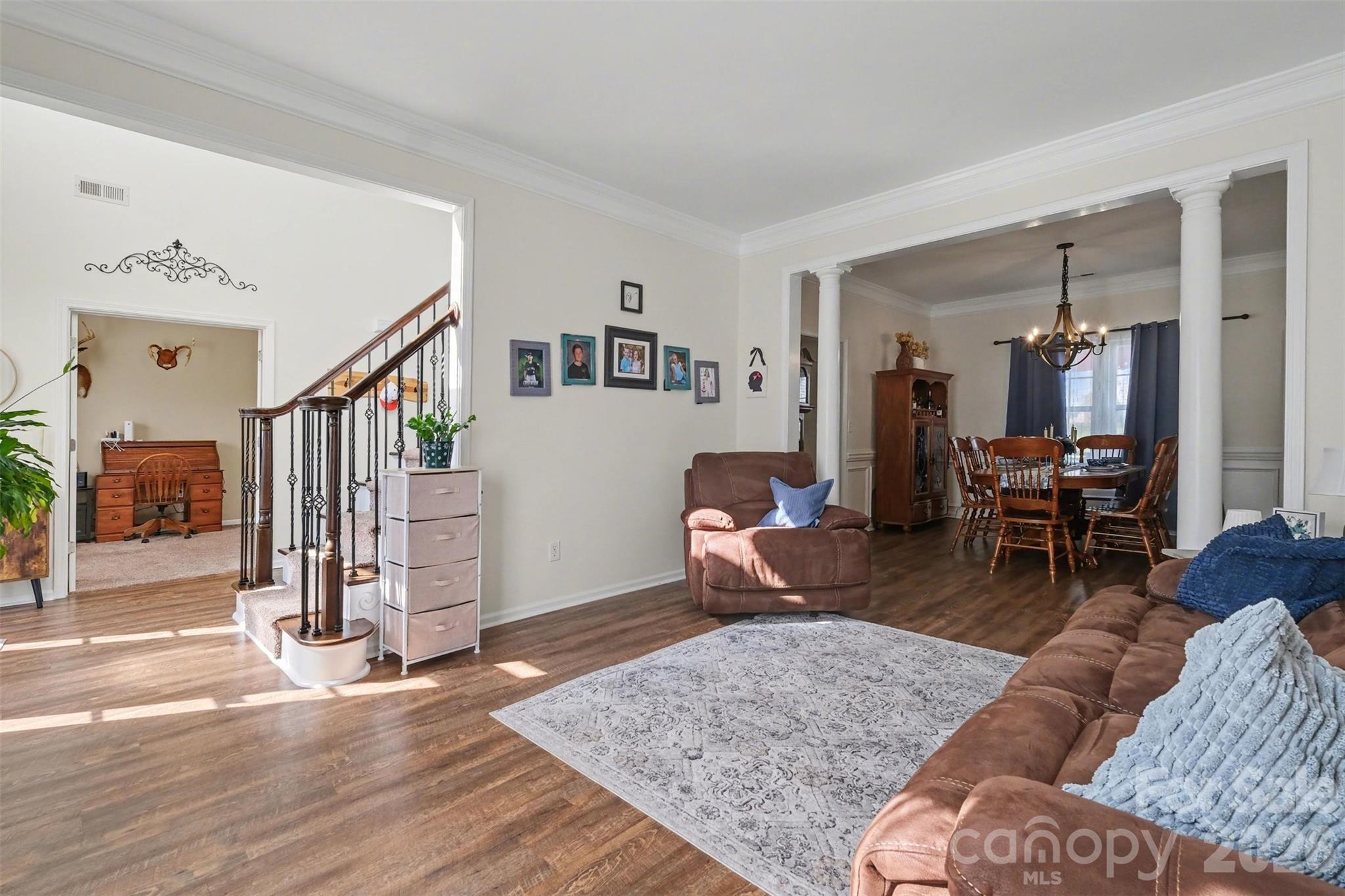 523 Whitehead Court Fort Mill, SC 29708 - Photo 6 of 48 a living room with furniture and wooden floor