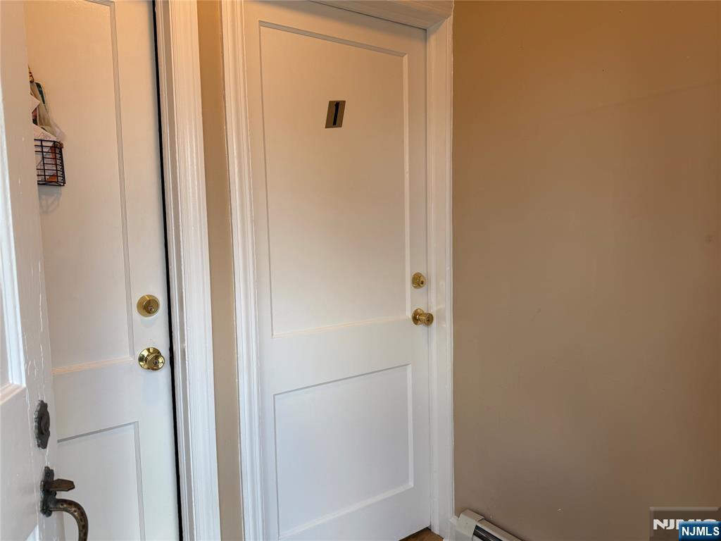 40 Hope Street, Unit 1 East Rutherford, NJ 07073 - Photo 3 of 14 a bathroom with a shower