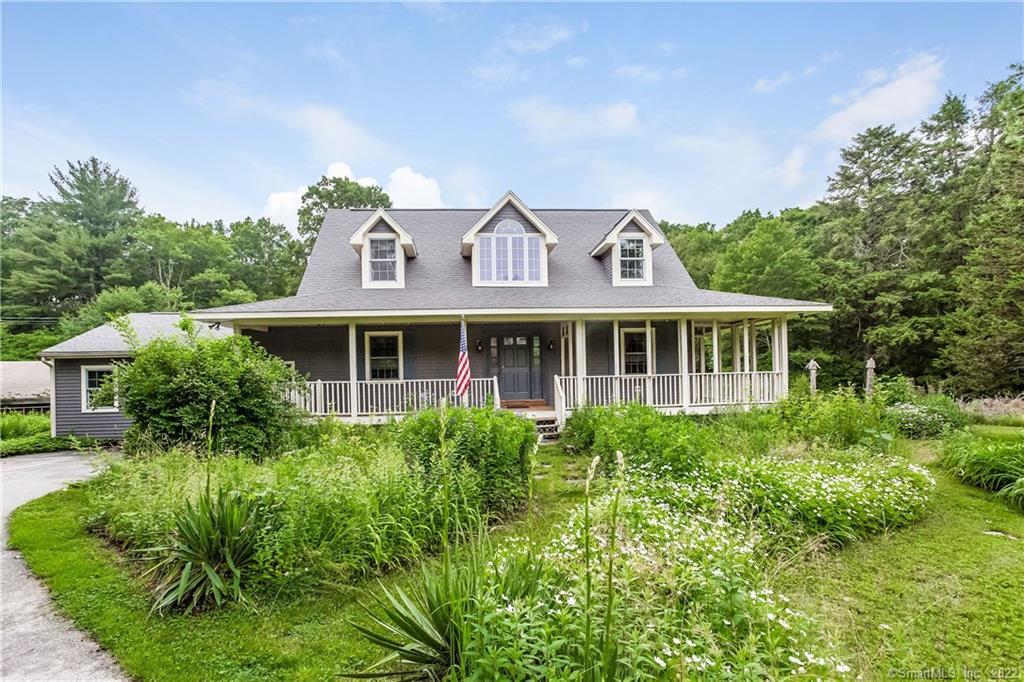 44 Laurel Road Harwinton, CT 06791 - Photo 1 of 1 a front view of house with yard and green space