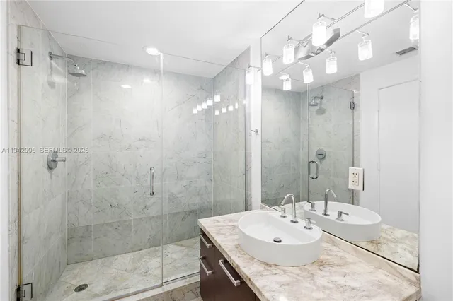 a bathroom with a washer and dryer