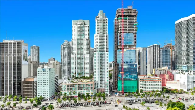 a view of a city with tall buildings