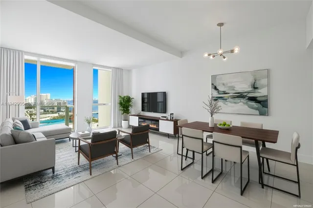 a view of a room with an empty space and a window