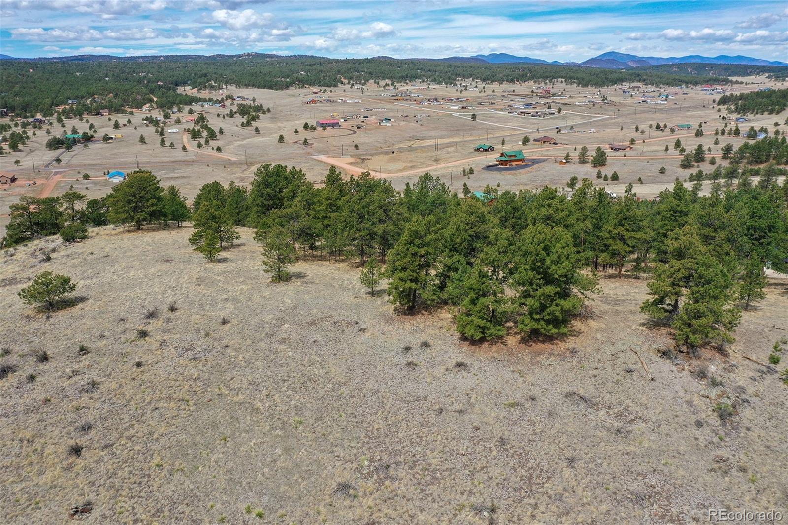81 High Pasture Road Florissant, CO 80816 - Photo 22 of 26 a view of a beach with a mountain