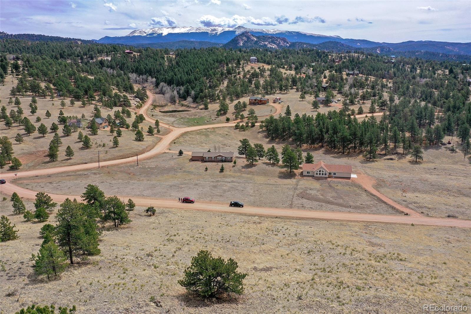 81 High Pasture Road Florissant, CO 80816 - Photo 26 of 26 a view of a town with mountains in the background